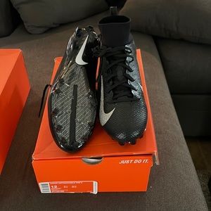 Nike Vapor Football black cleats. Size 13 never been worn.
